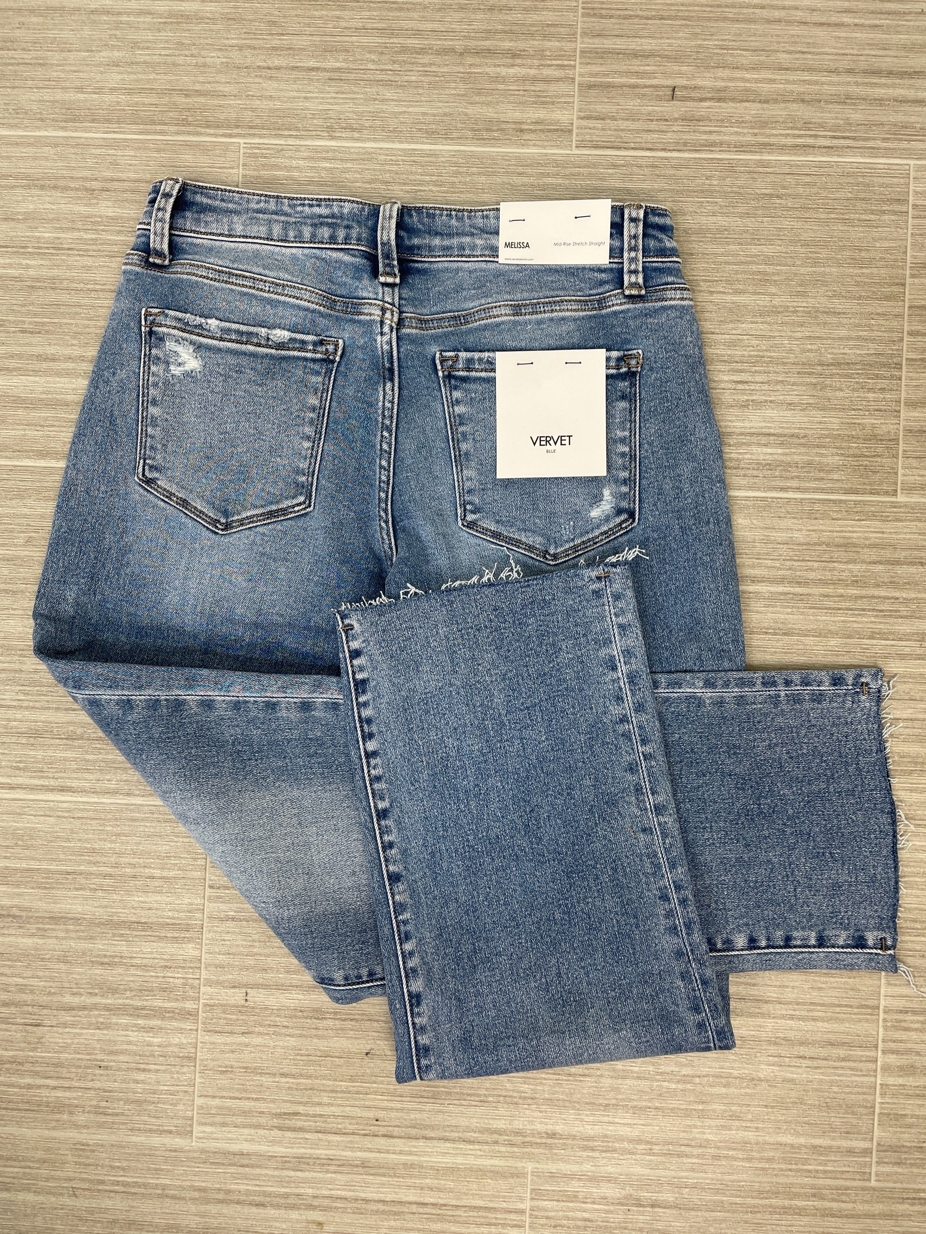 Mid Rise Straight Raw Hem Jean