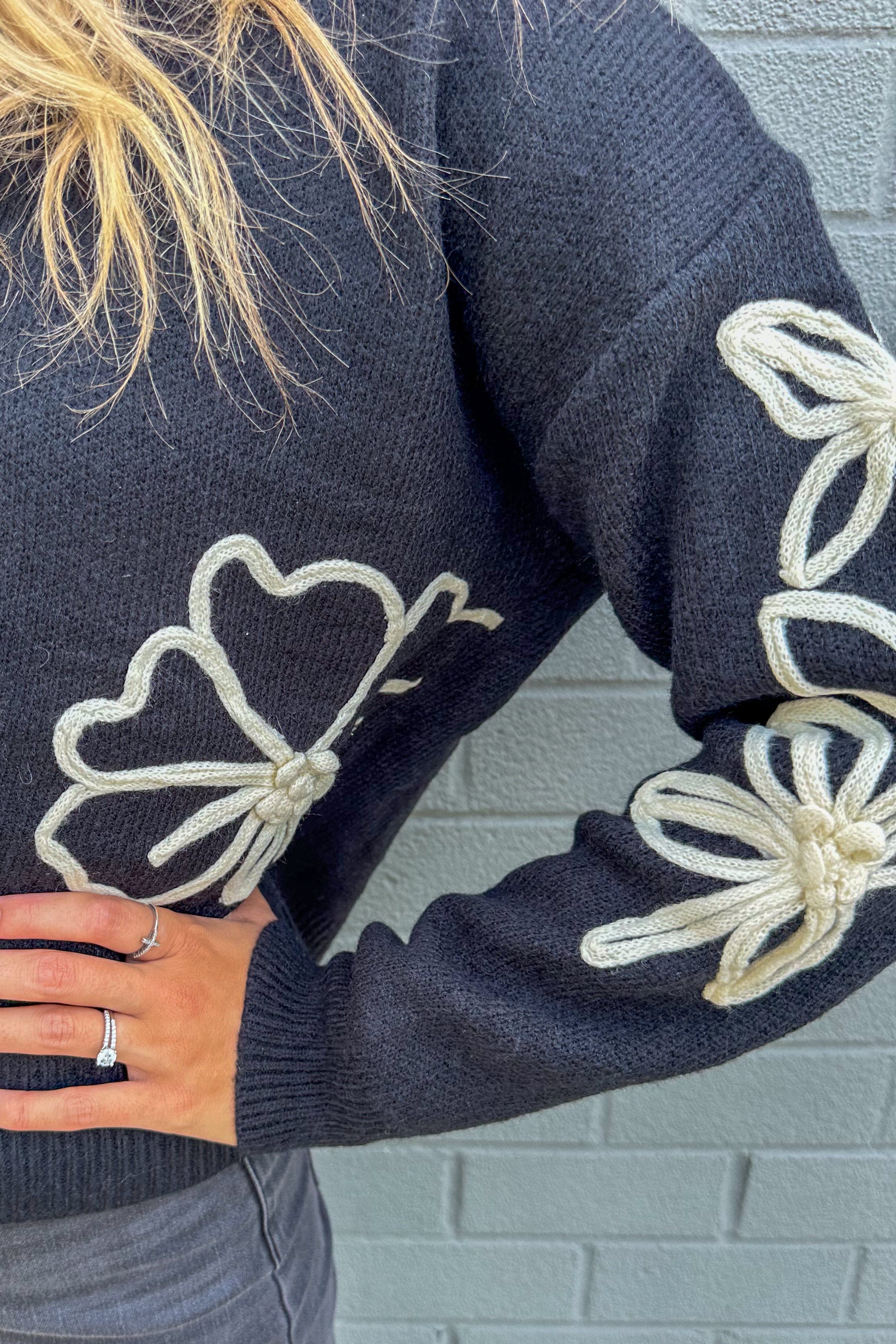 Black Sweater with Floral Detail details