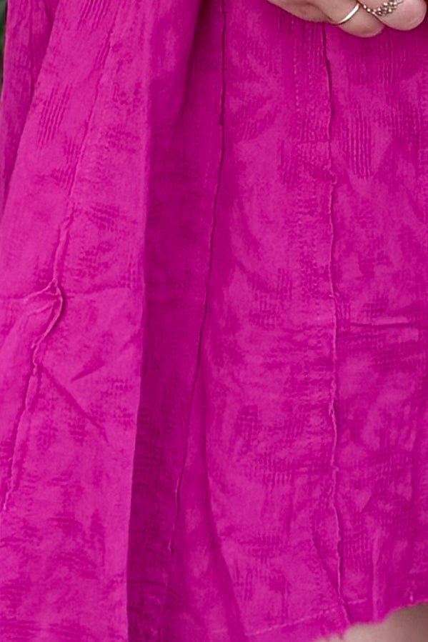 fuchsia shark bite hem dress, detail