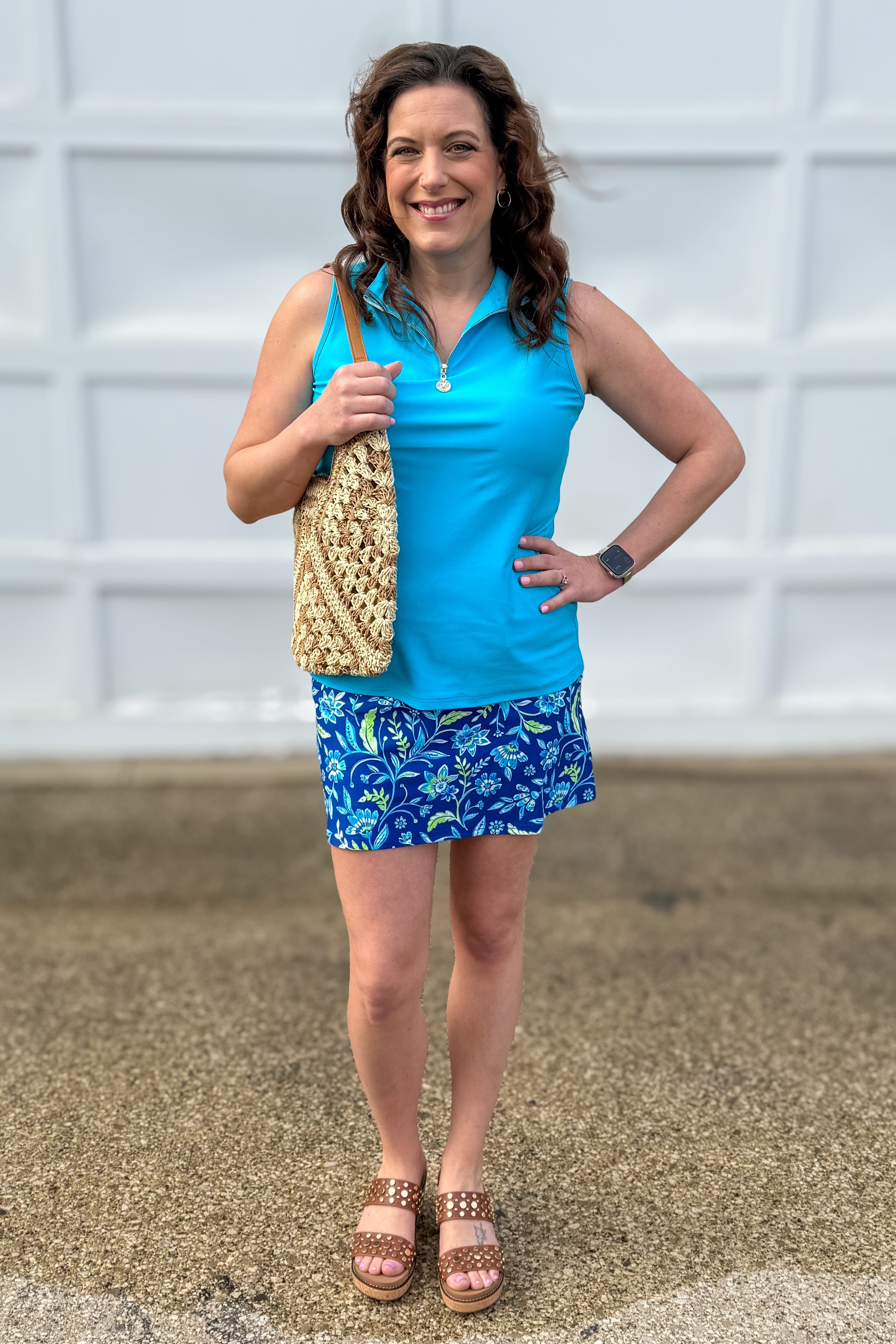 Sky Blue Sleeveless Front Zip Top styled