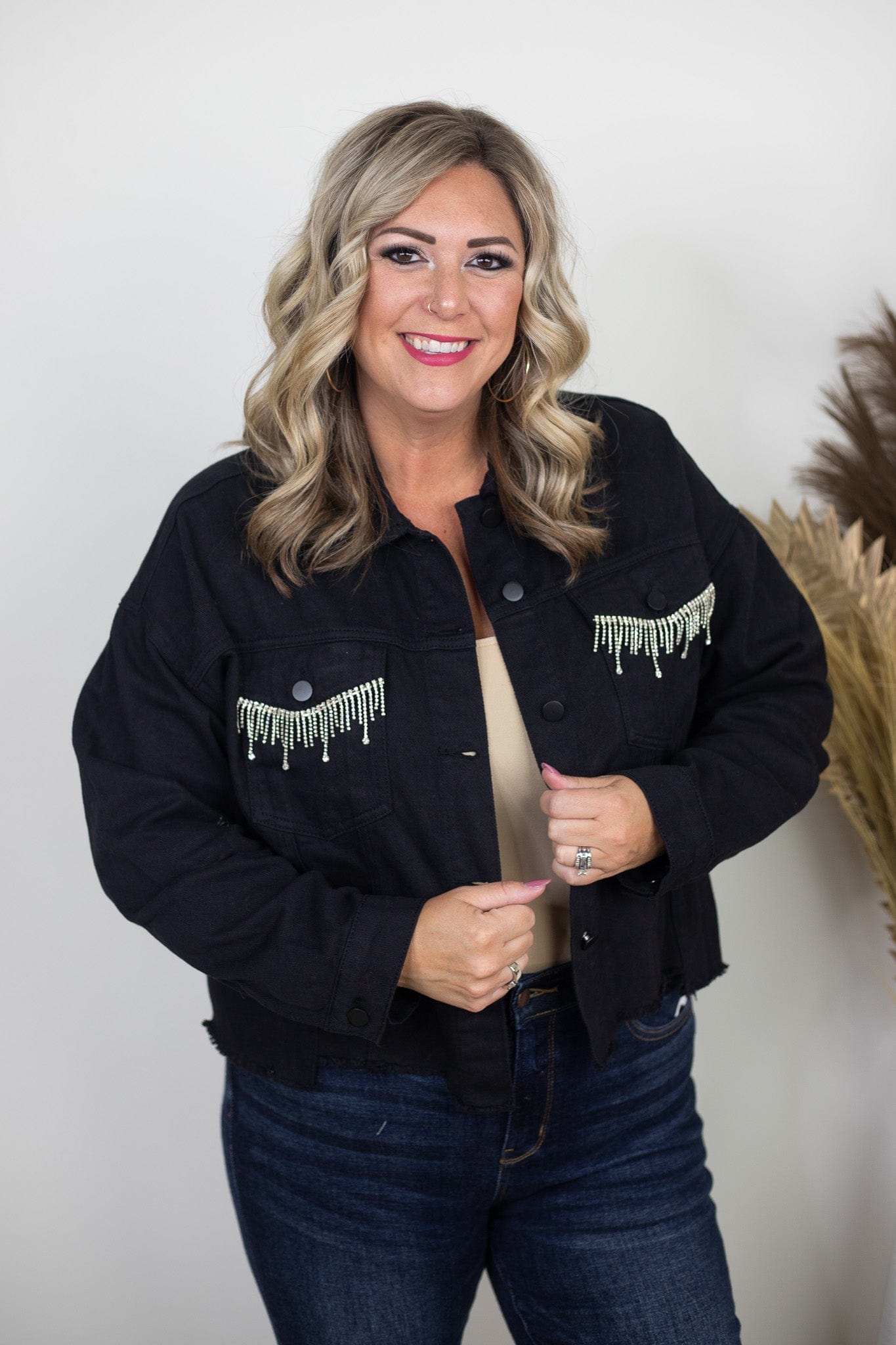 Black denim jacket fashion with fringe