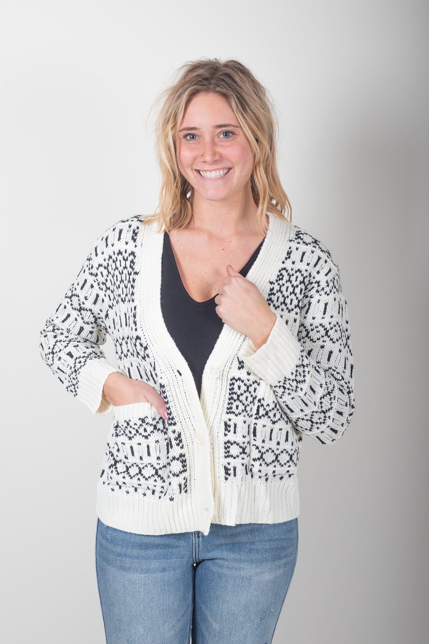 Cream Nordic Cable Knit Sweater bun