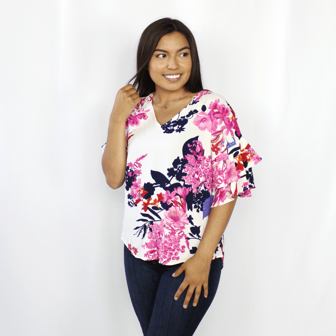 Pink floral blouse with layered bell sleeves