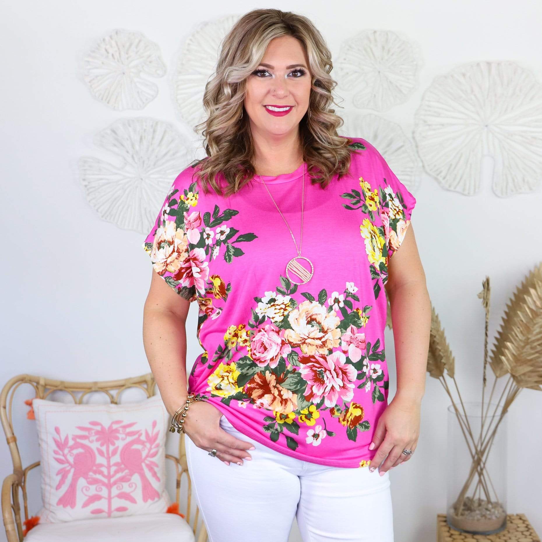 pink short sleeve shirt with colorful flowers