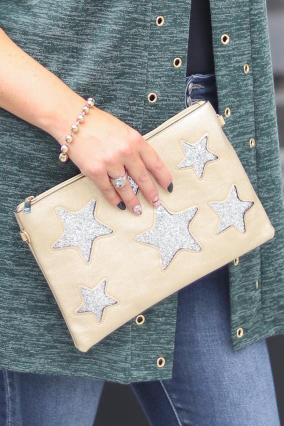 tan star cross body bag