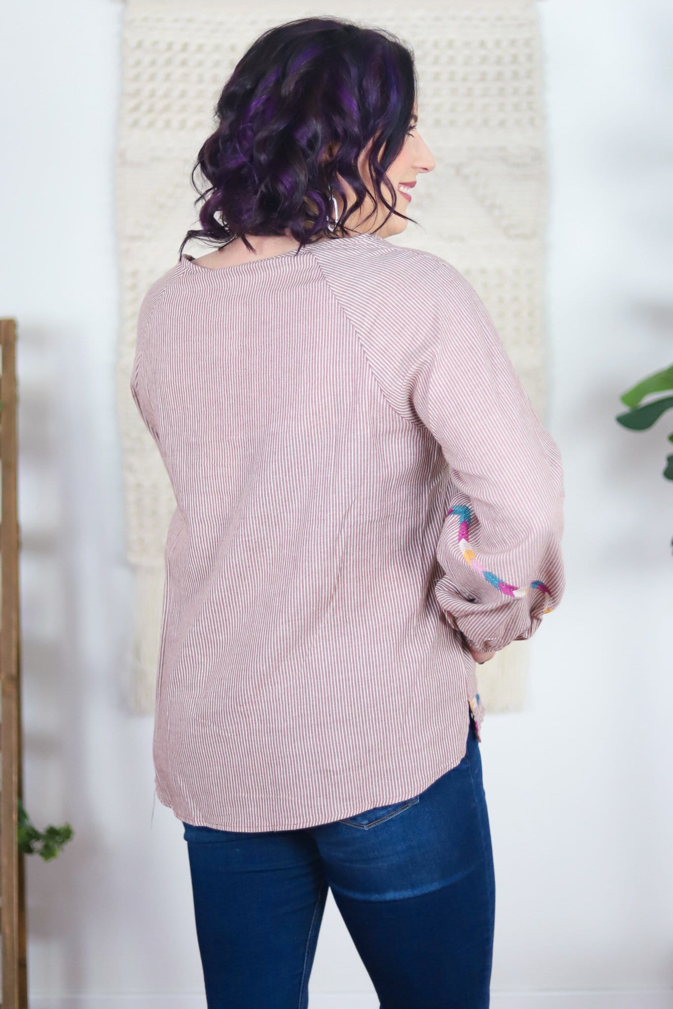 rust blouse colorful stitched pattern sleeve