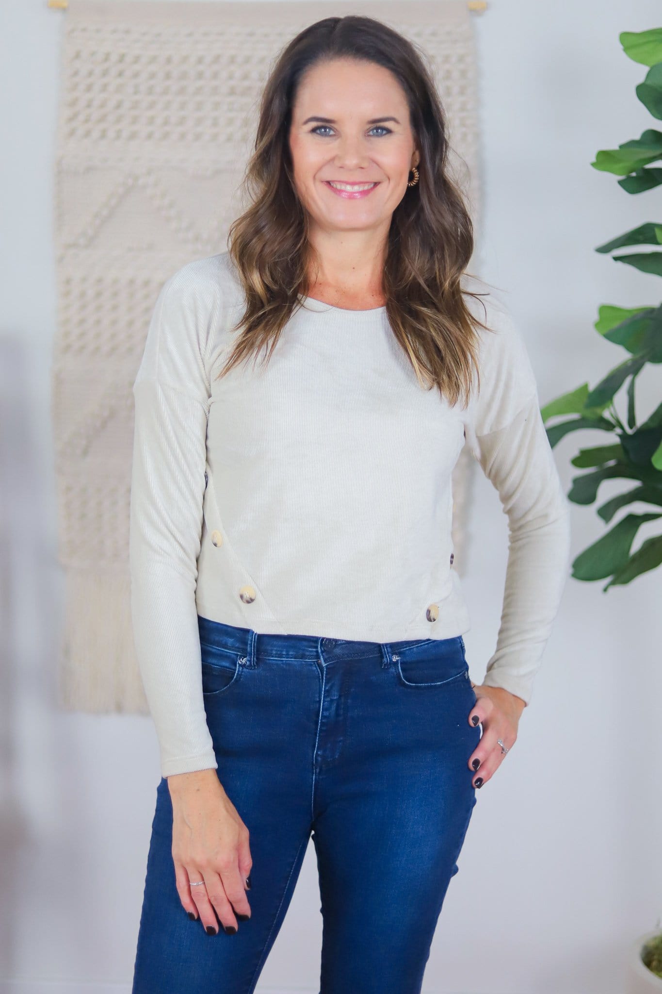 cream ribbed top with buttons on sides