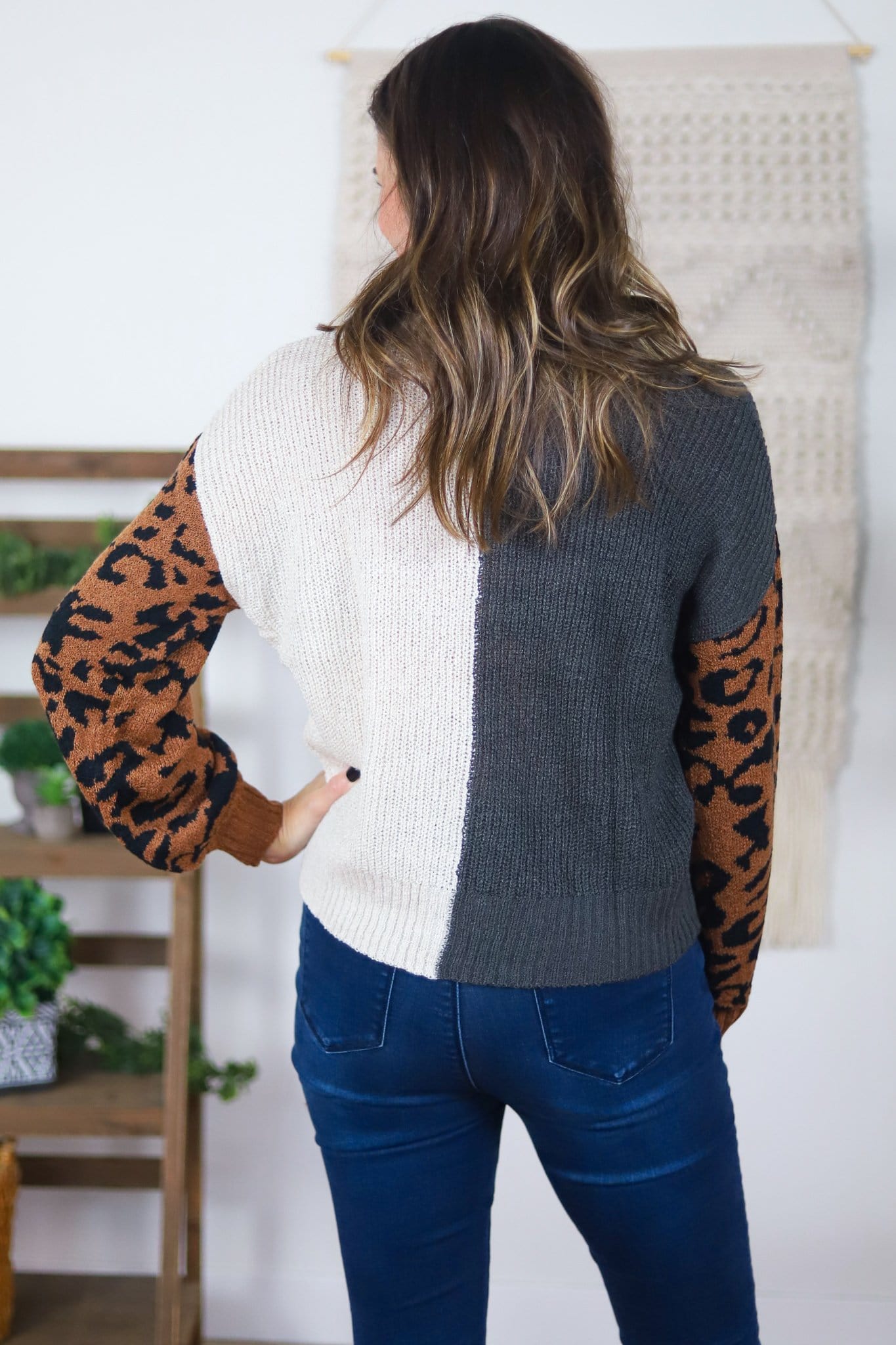 black white and leopard print sweater back