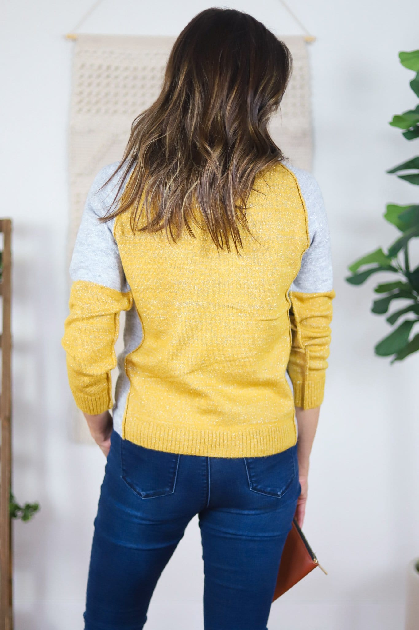 yellow and grey sweater back