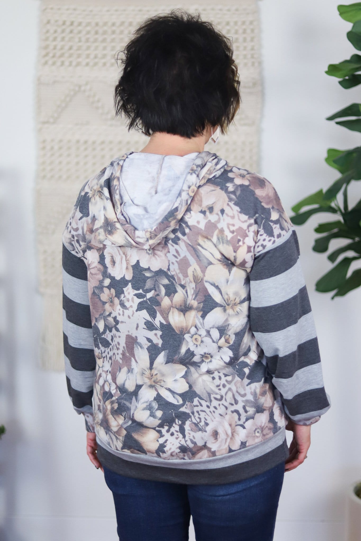 floral hoodie with grey striped sleeves and trim back