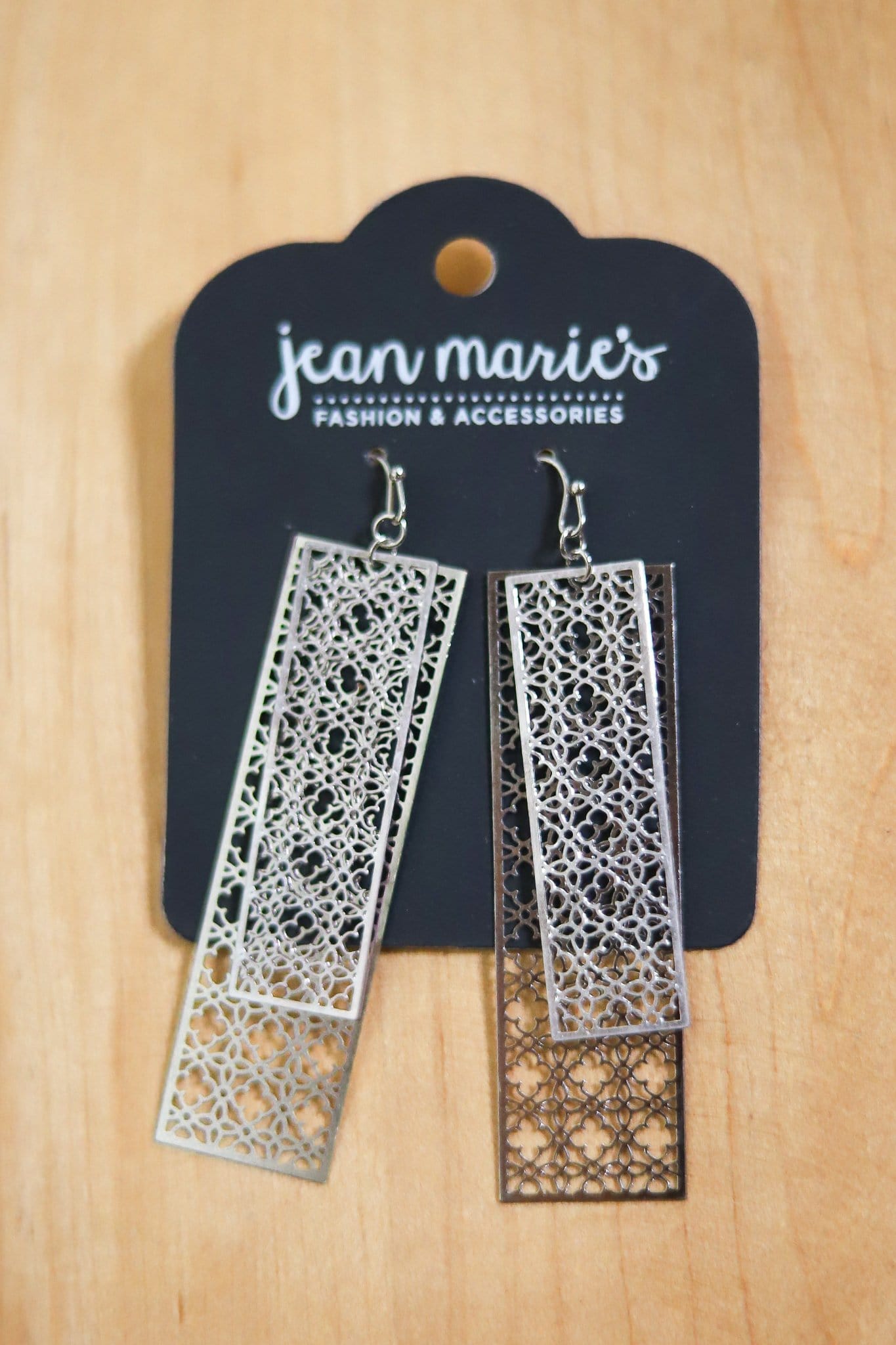 silver and bronze light geometric earring