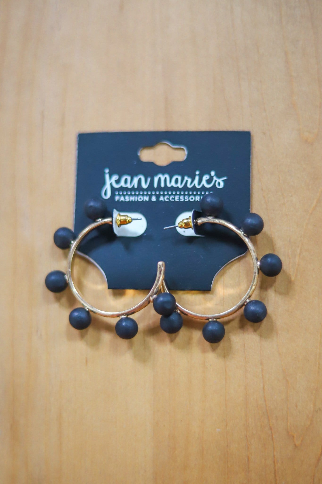 black beaded hoop earring