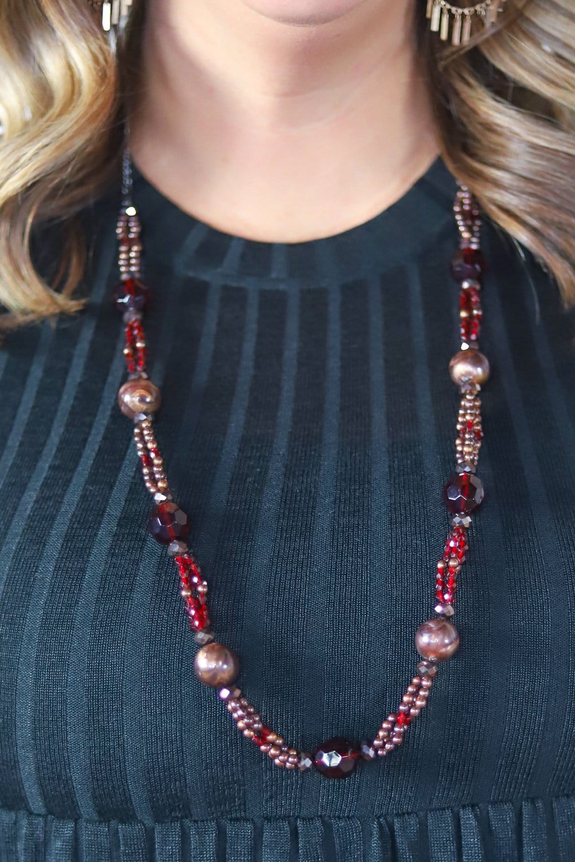 red and maroon beaded necklace