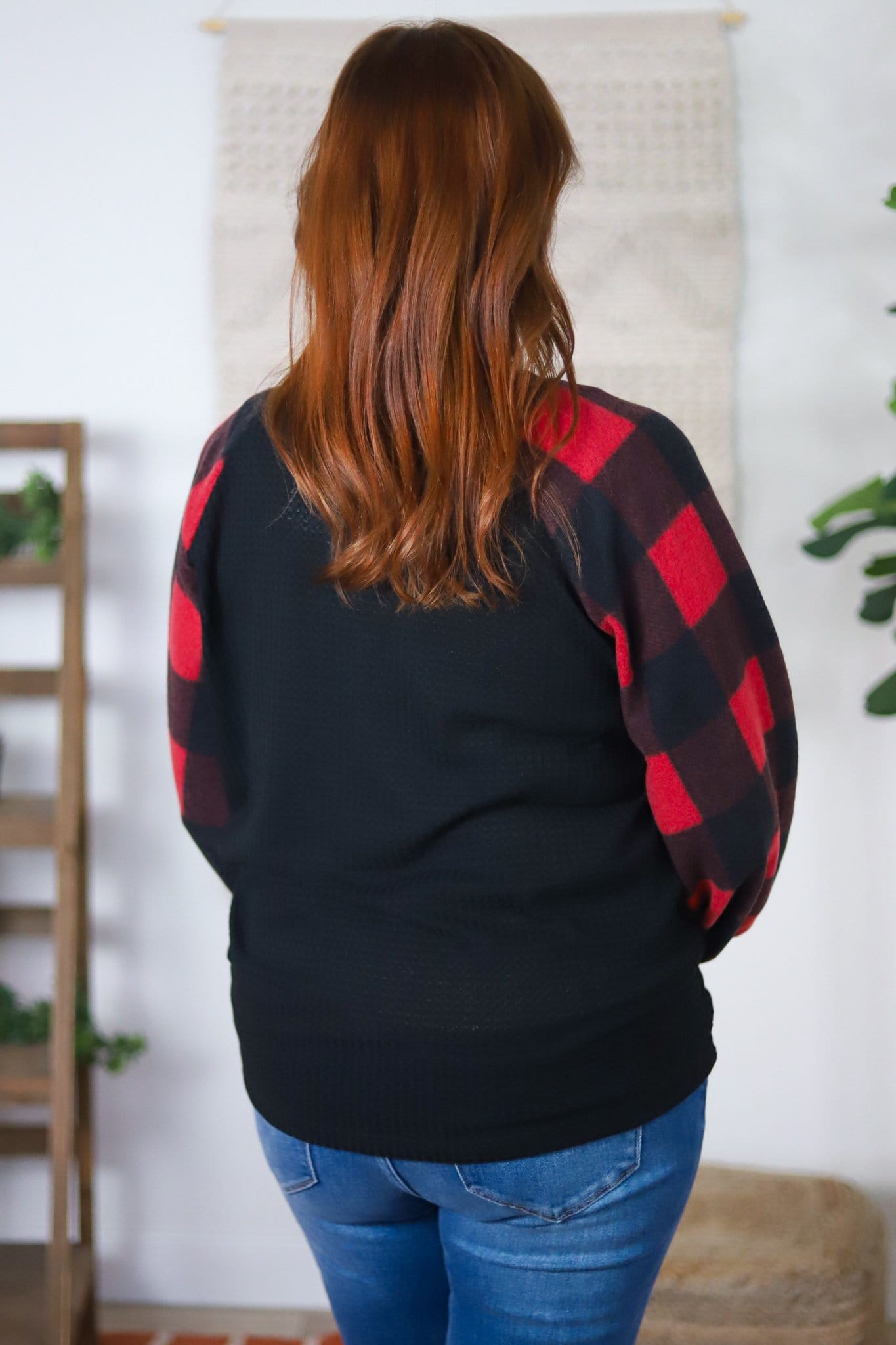 red sleeve black body back