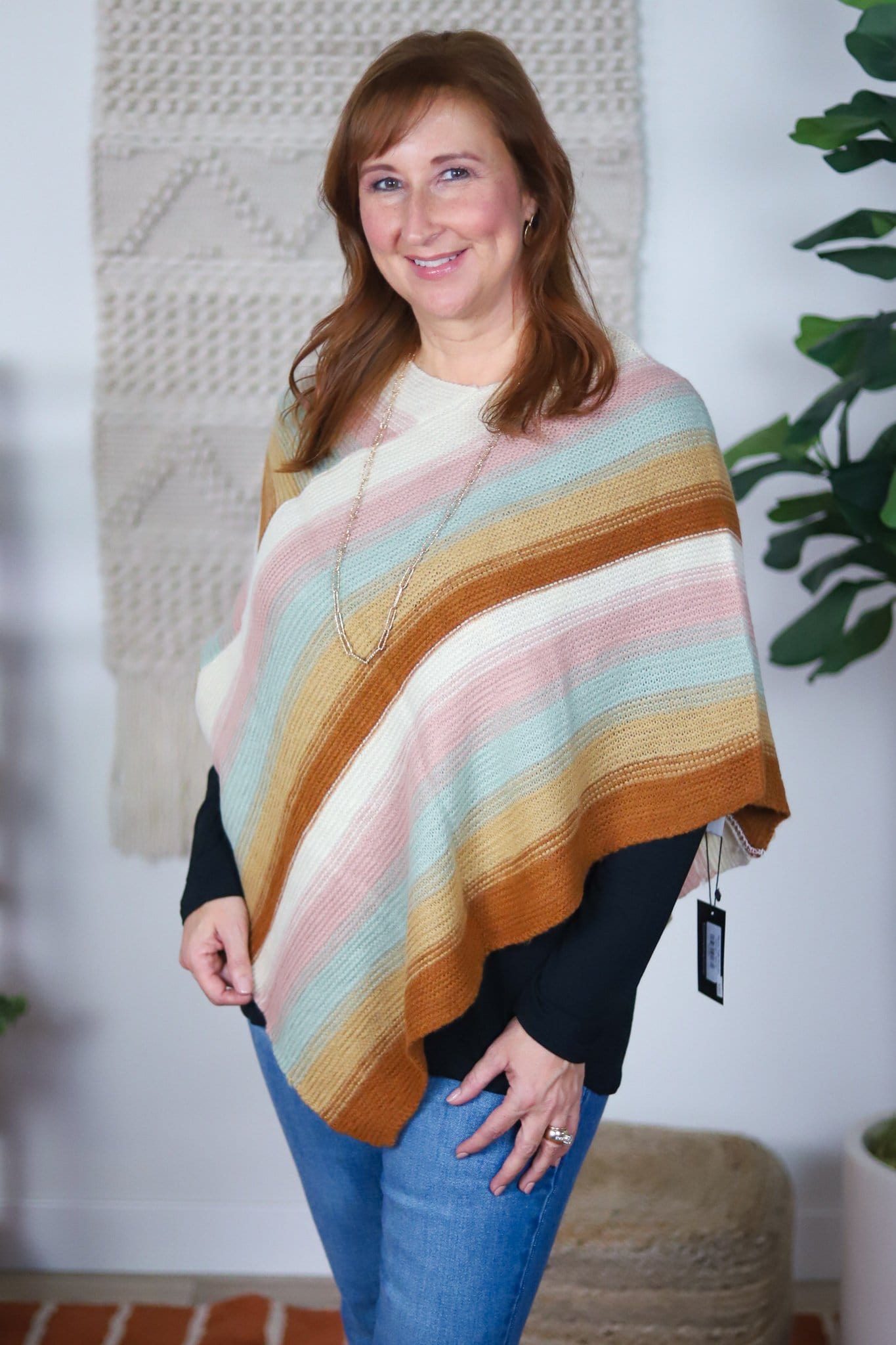 rust tan teal pink white knit poncho