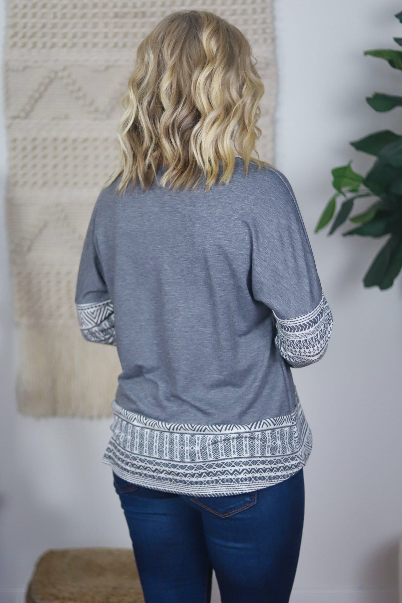 back of geometric grey white top