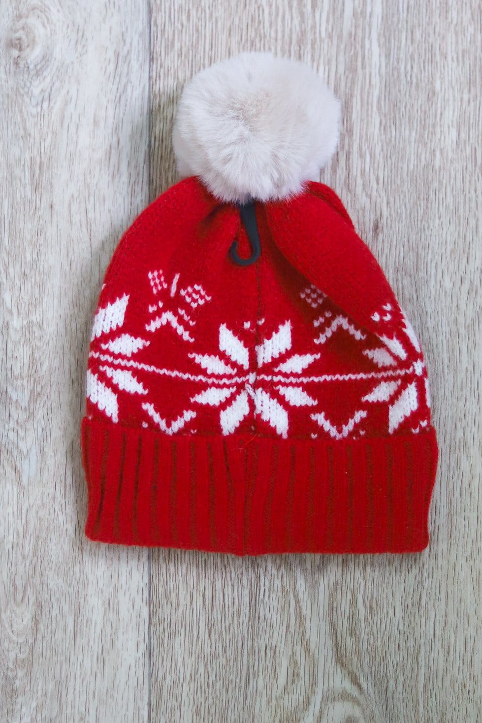 red winter pattern hat