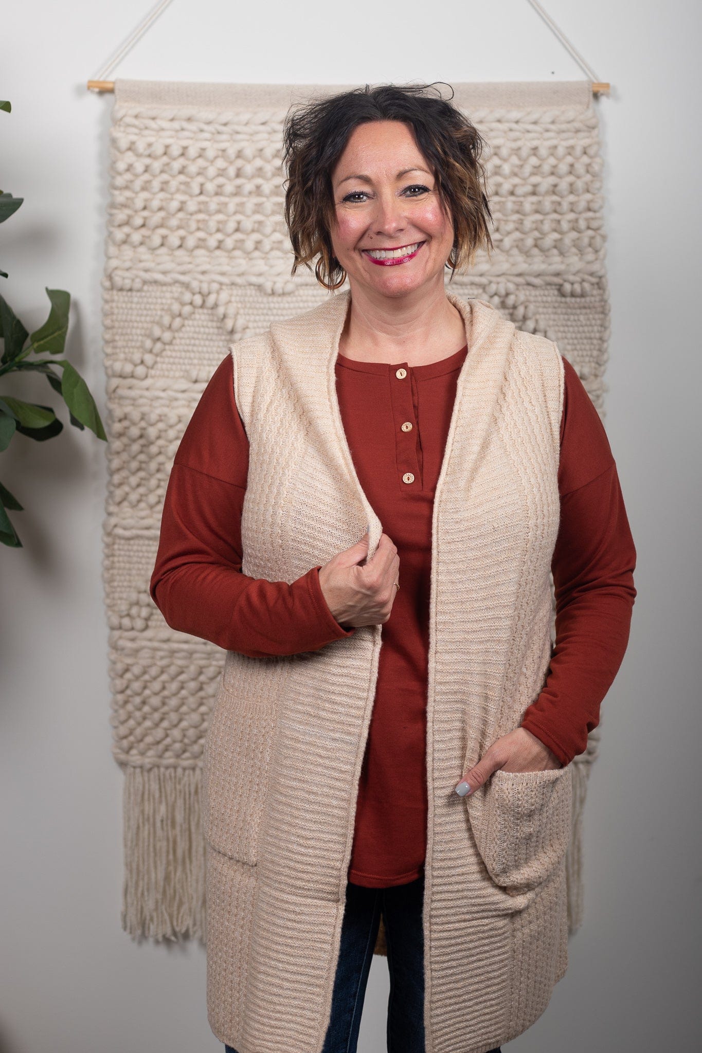 beige sleeveless cardigan