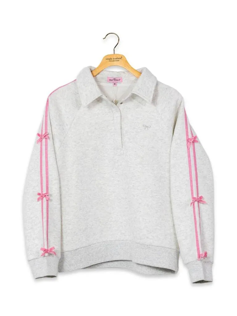Stellar Quarter Snap Pink Bow Pullover