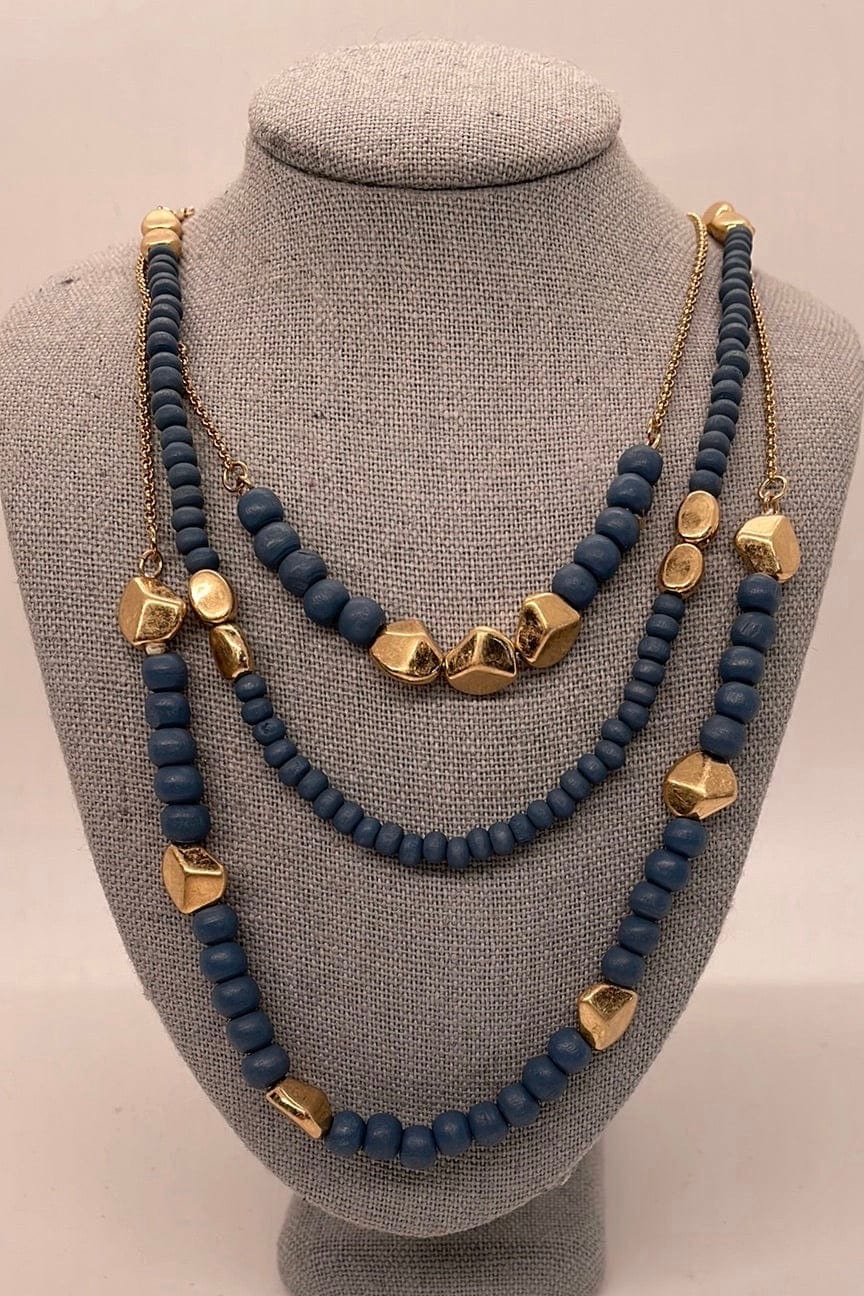 Blue Triple Layer Bead Necklace, on stand
