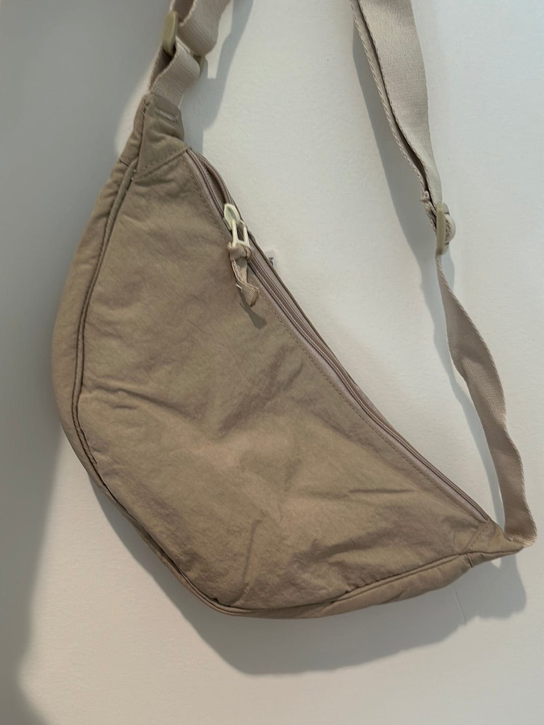 Ivory Crest Crossbody Bag