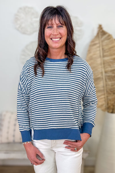 Denim Stripe Exposed Split Hem Knit Top
