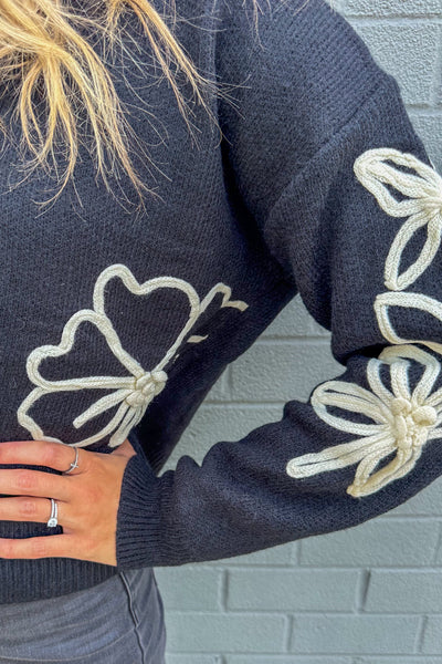 Black Sweater with Floral Detail details