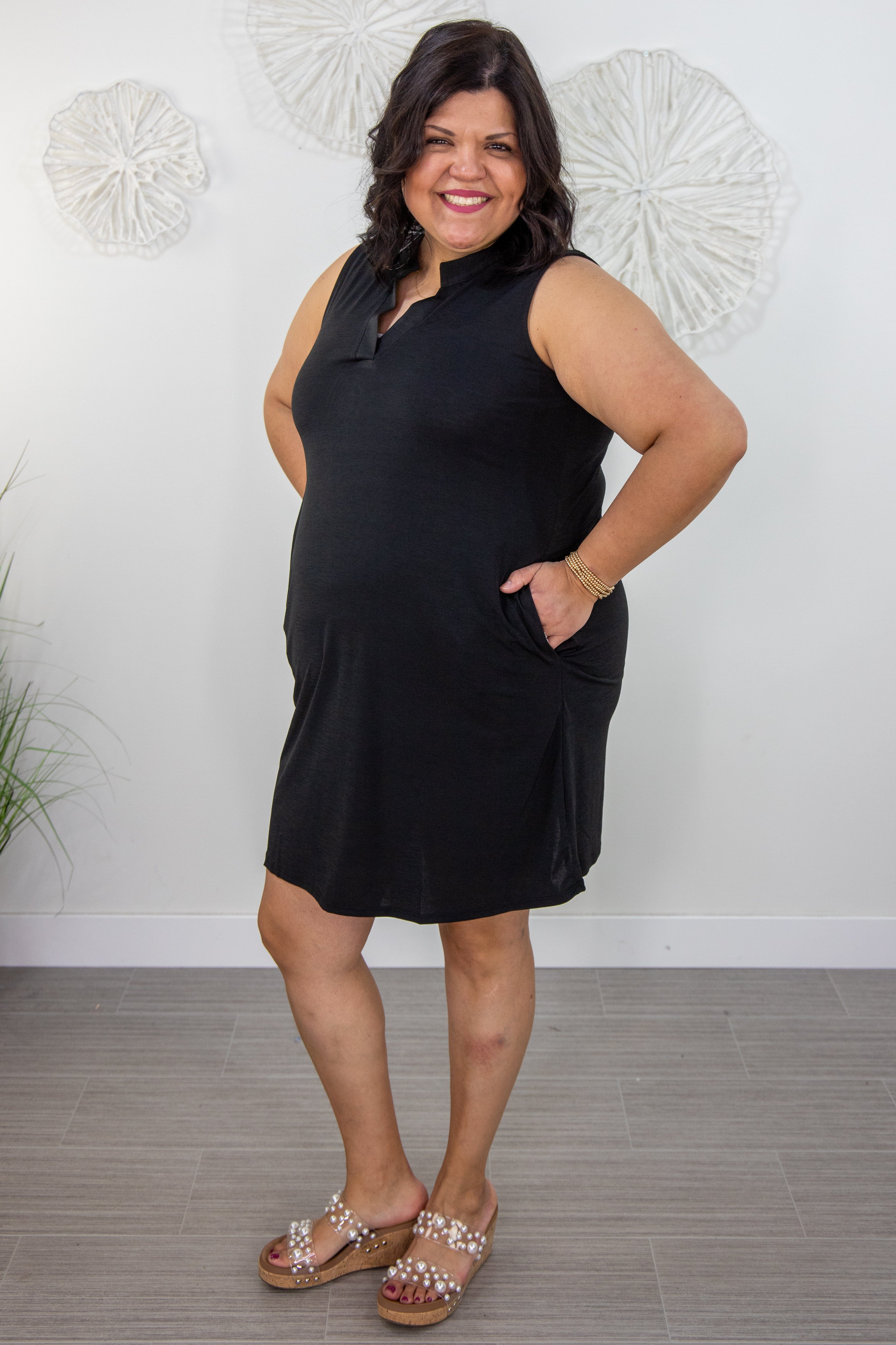 Black Sleeveless Dress with Pockets styled