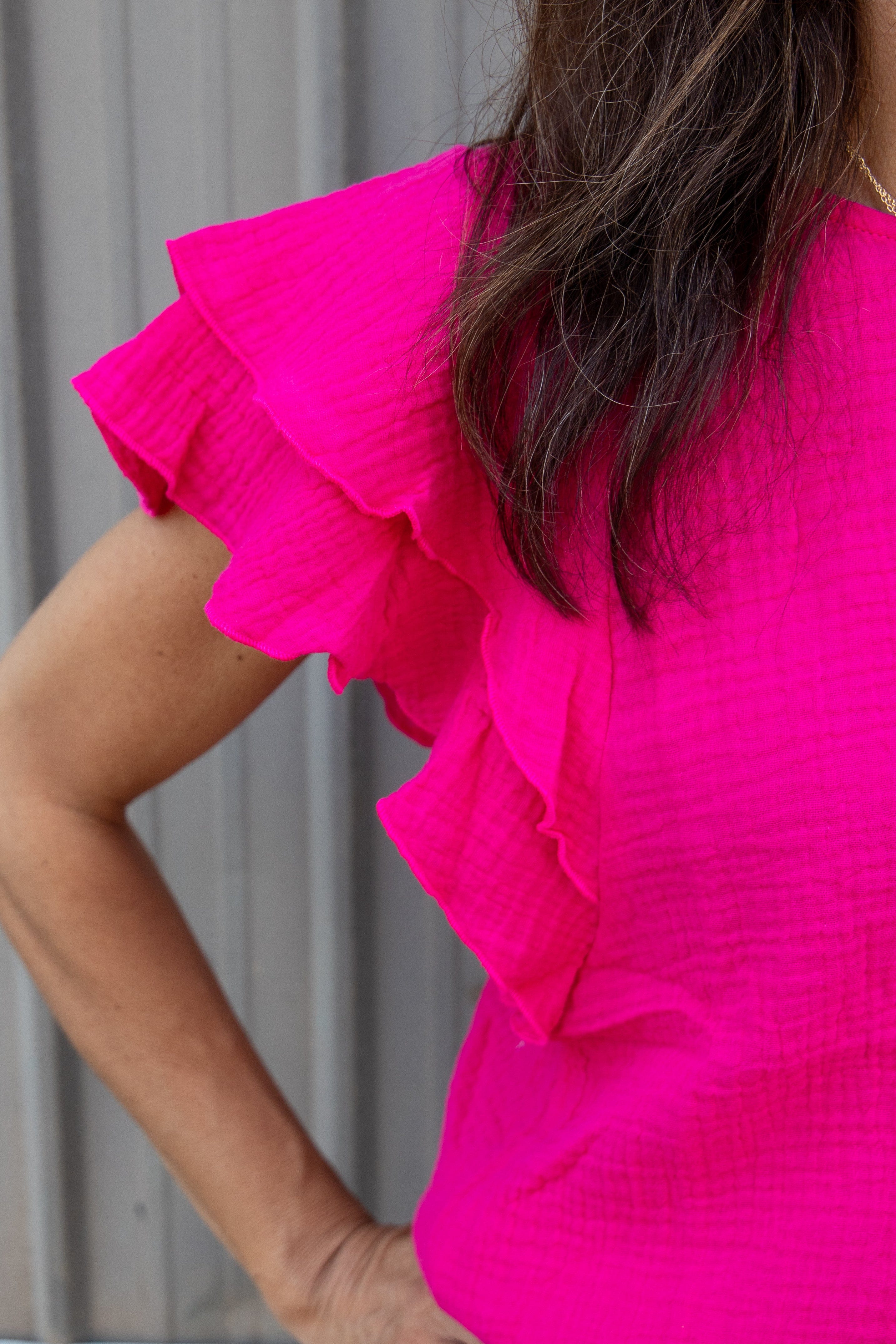 Fuchsia Ruffle Sleeve Gauze Top fabric up close