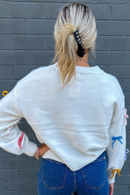 Ivory Sweater with Colorful Bows