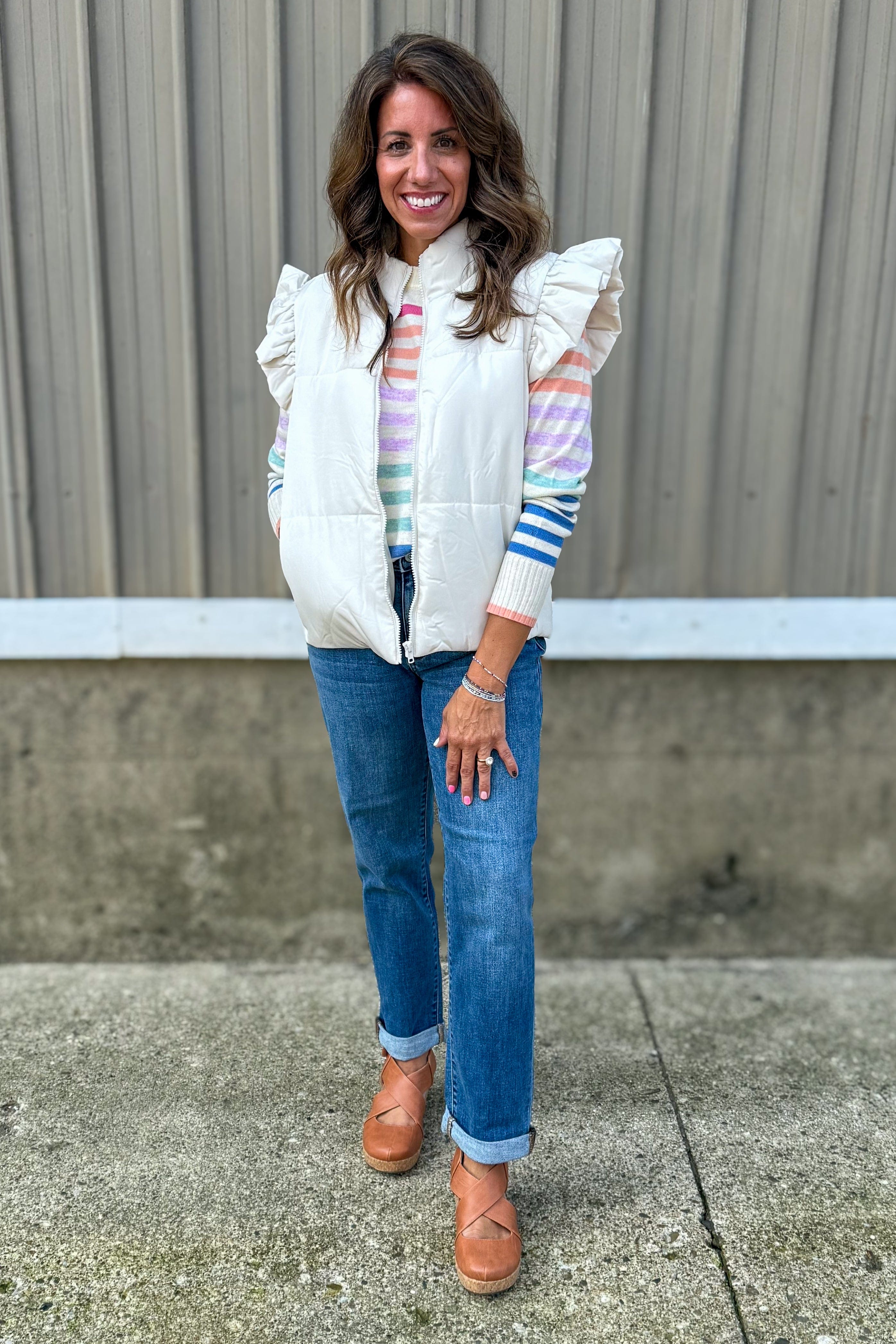 Pink/Orange Multi Stripe Crewneck Sweater styled with vest