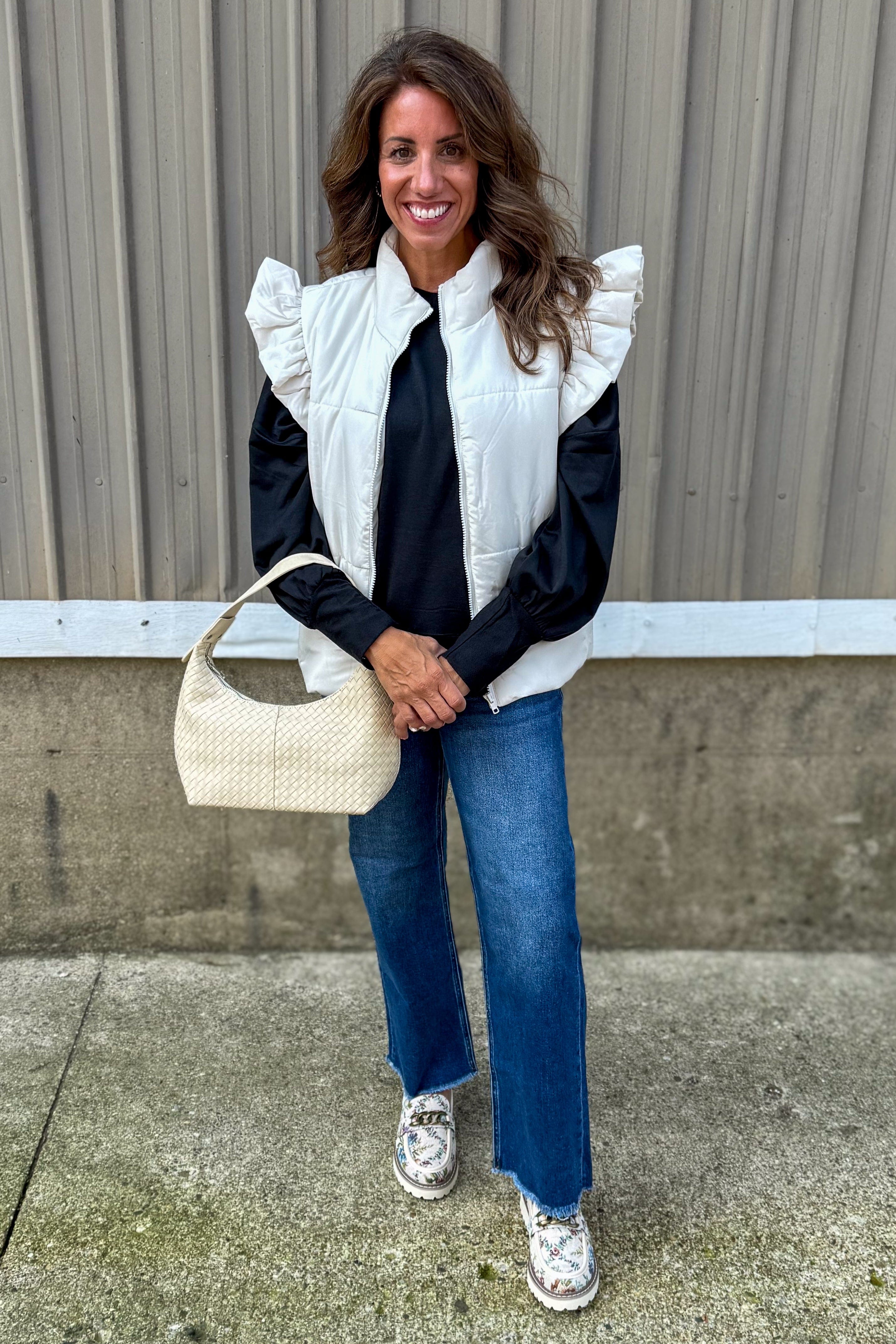 Black Long Sleeve High-Low Top styled with vest