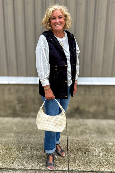 Ivory Long Sleeve High-Low Top styled with vest