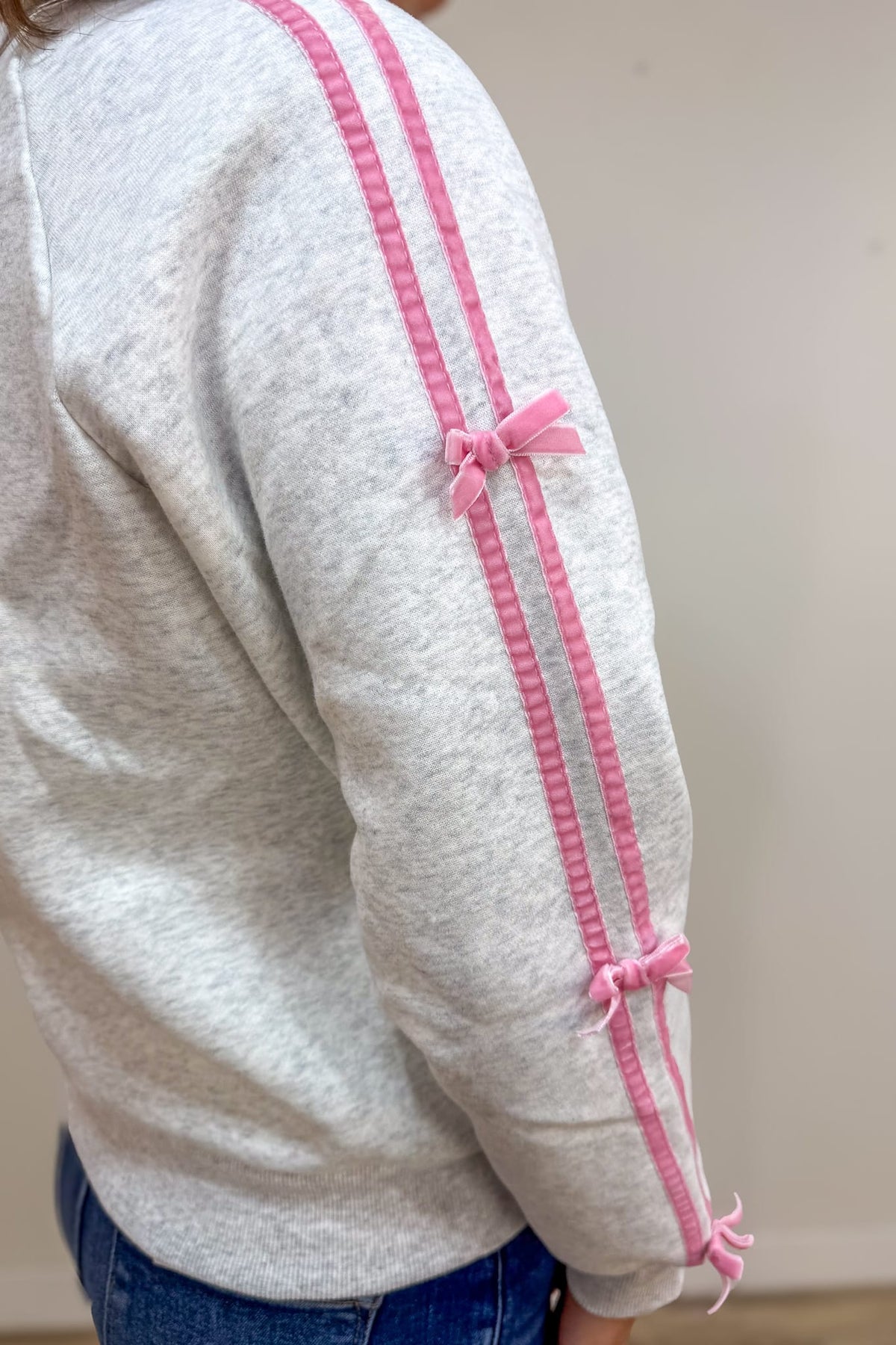 Stellar Quarter Snap Pink Bow Pullover Detail