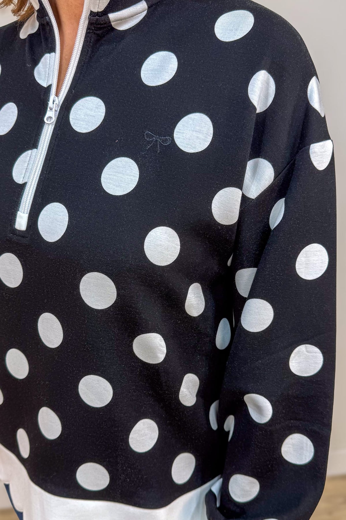 Black Polka Dot Scallop Zip Pullover Detail