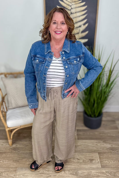 Ivory V-Neck Textured Stripe Top styled with denim jacket