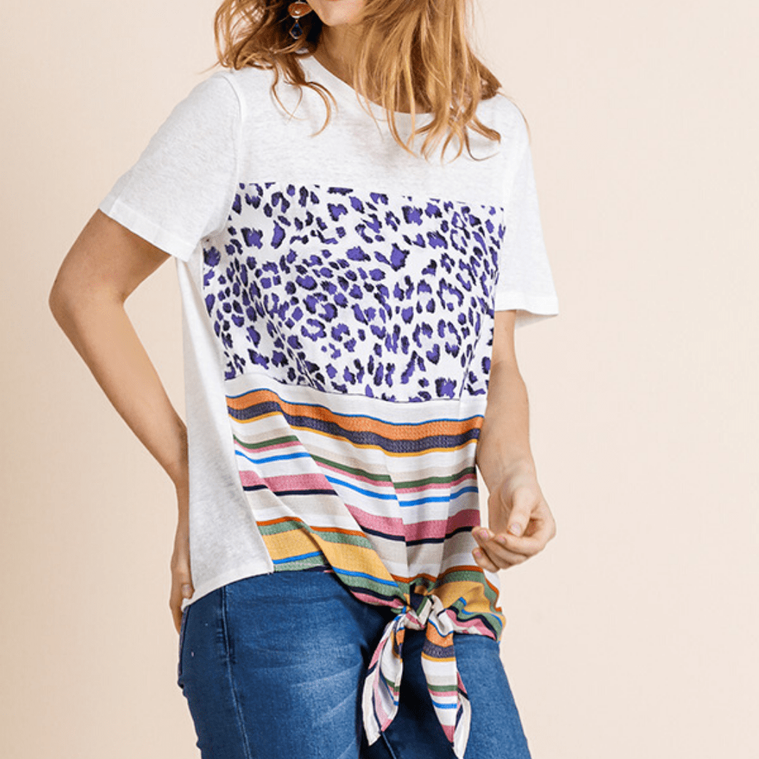 White and blue animal print short sleeve shirt with multicolor stripes