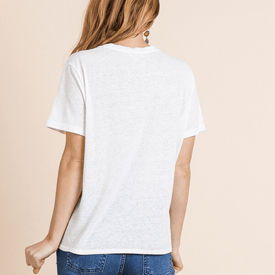White and blue animal print short sleeve shirt with multicolor stripes
