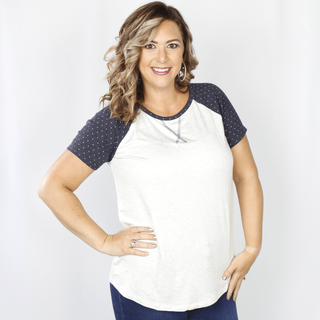 White short sleeve shirt with dark gray star patterned sleeves