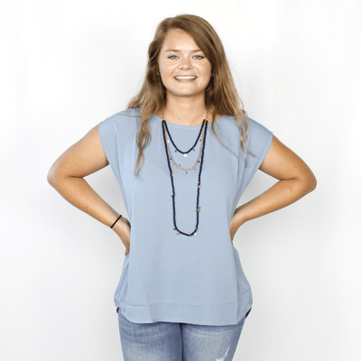 Light blue tank top, semiformal