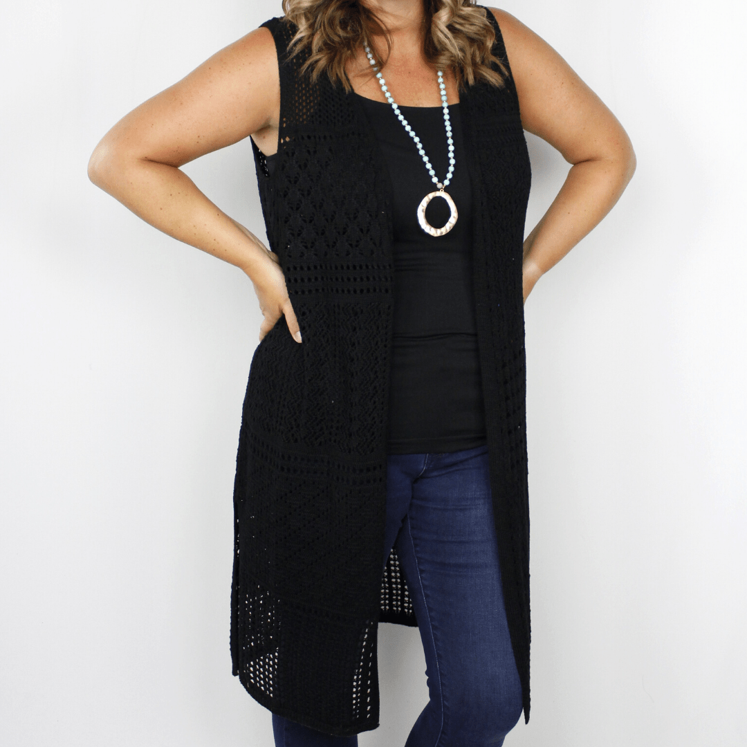 Black knit vest, sheer, knee-length