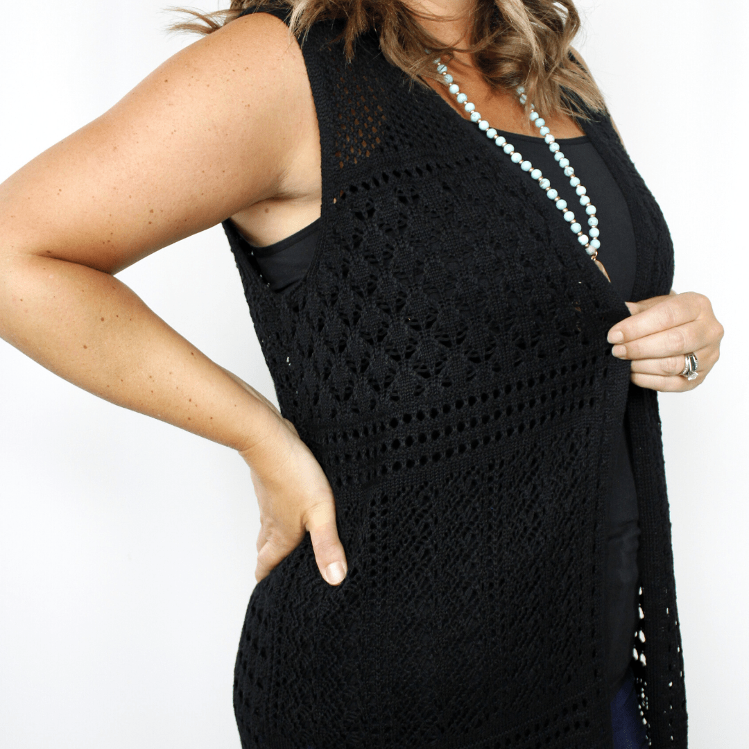 Black knit vest, sheer, knee-length