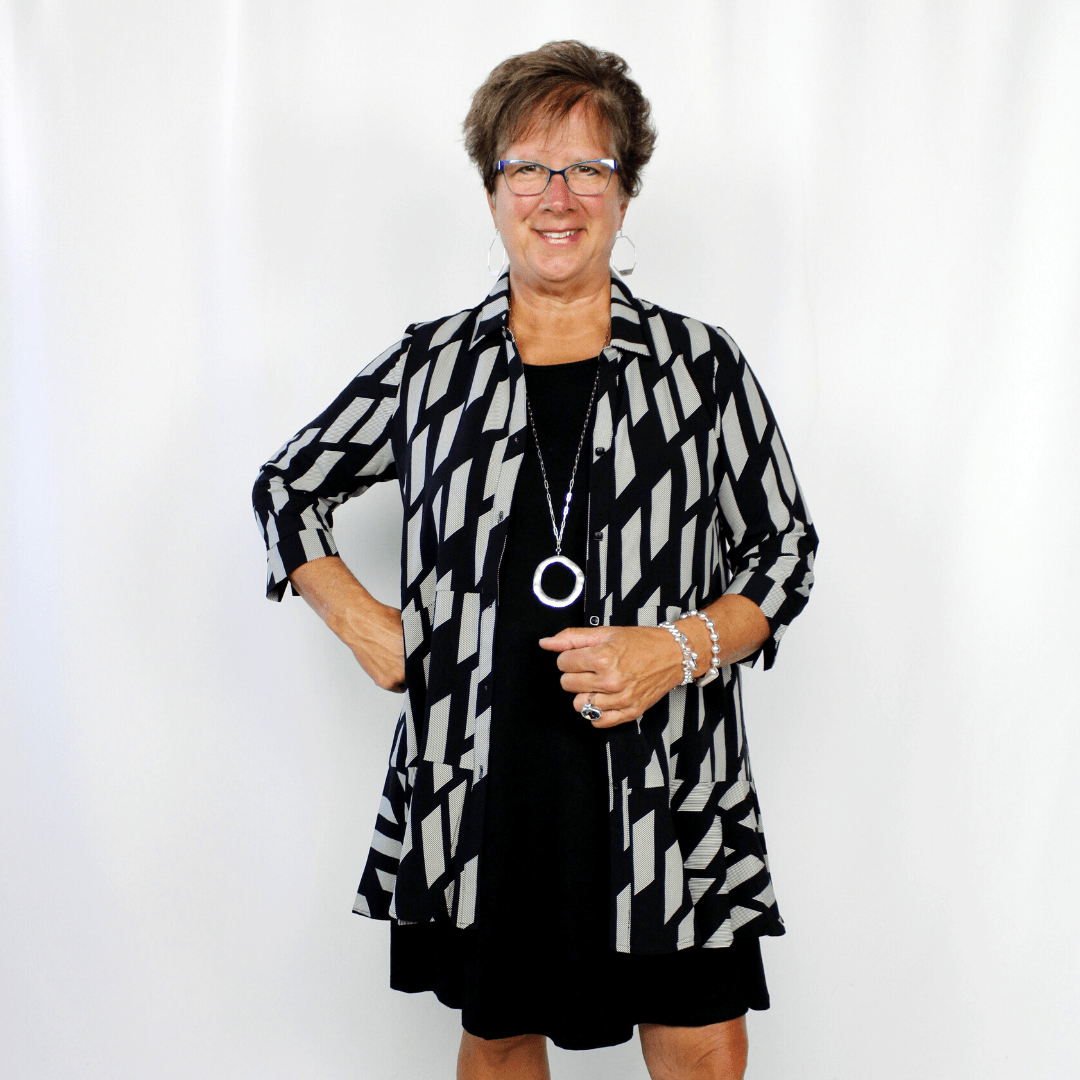 Black and white 3/4 length sleeve top, geometric pattern