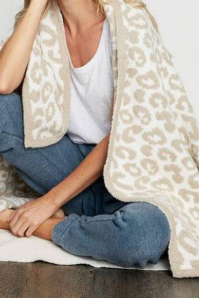leopard print throw draped 