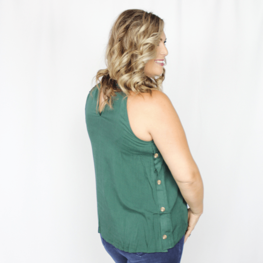Green halter neckline tank top with button accents down the side  Edit alt text