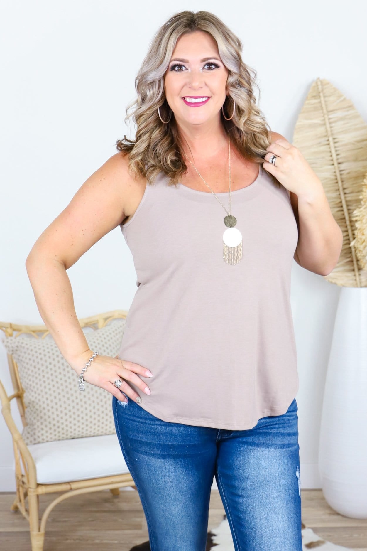 Sleeveless Round Neck Hem Top