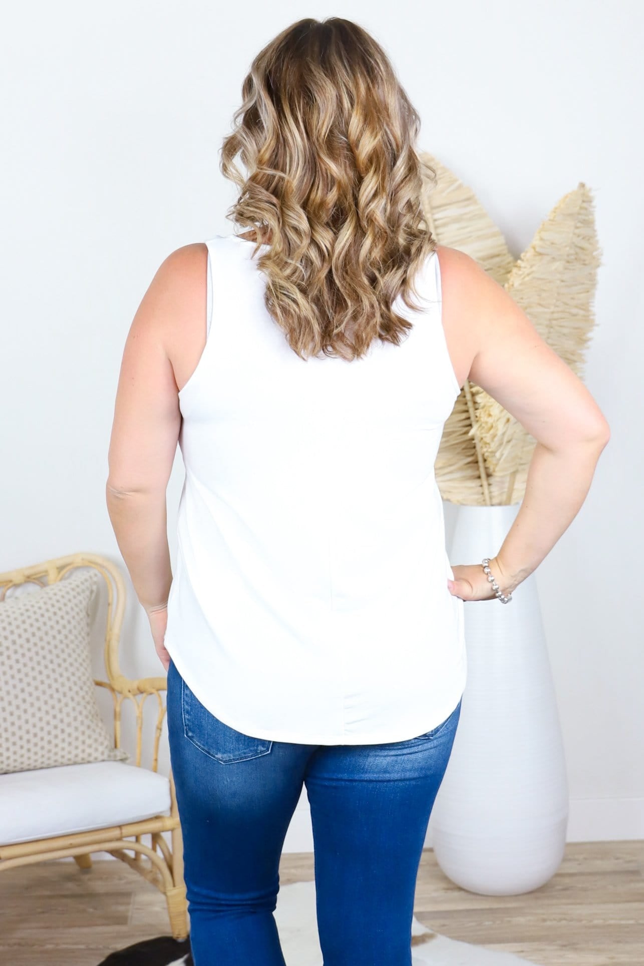 Sleeveless Round Neck Hem Top