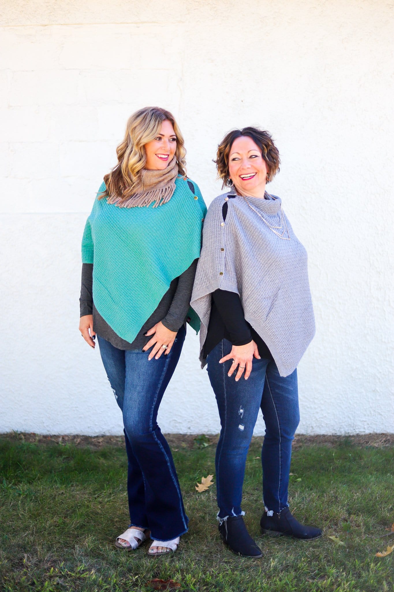 blue and lavender ponchos outside 