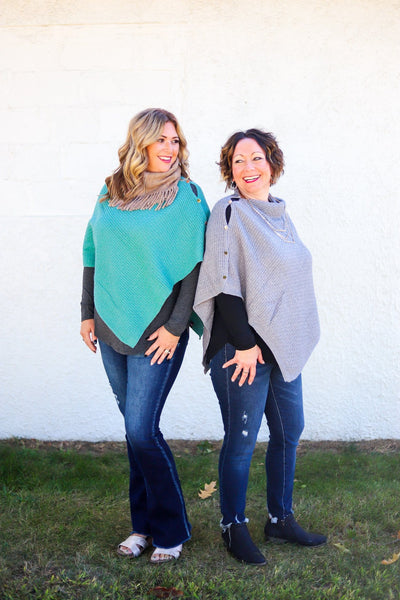 blue and lavender ponchos outside 
