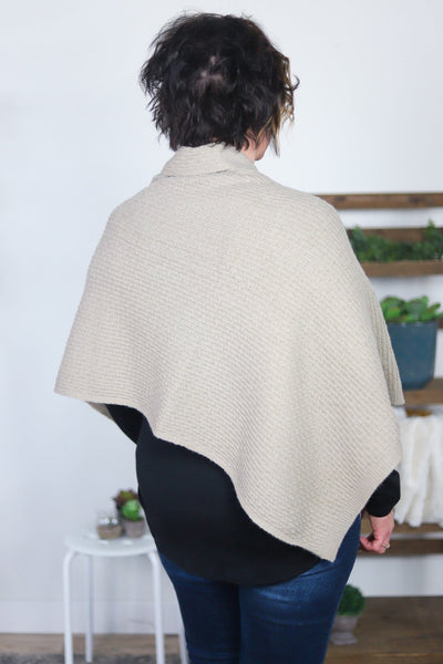 back of triangle over shoulder cut oatmeal poncho